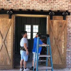 Two Professional working on wood doors